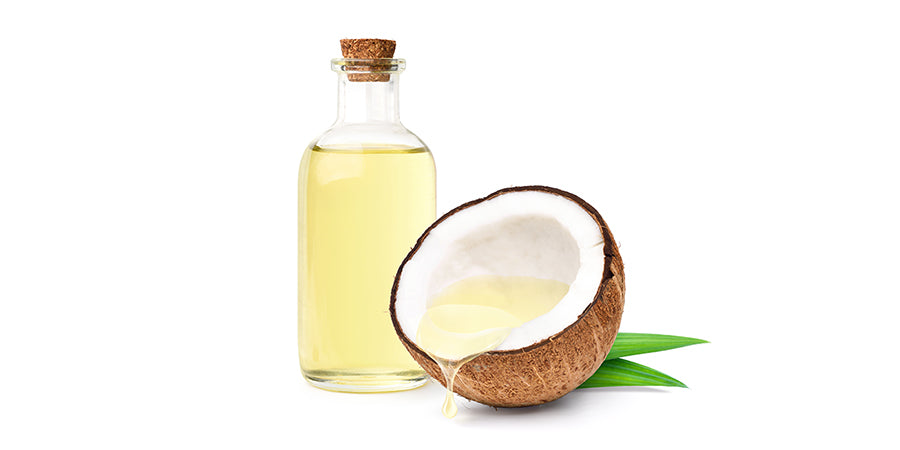 coconut and bottle of coconut oil