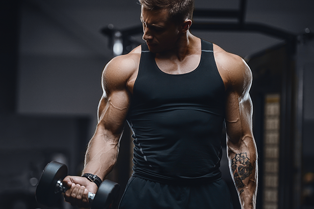 lean men doing dumbbell curls