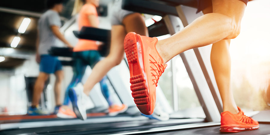 men running on treadmill